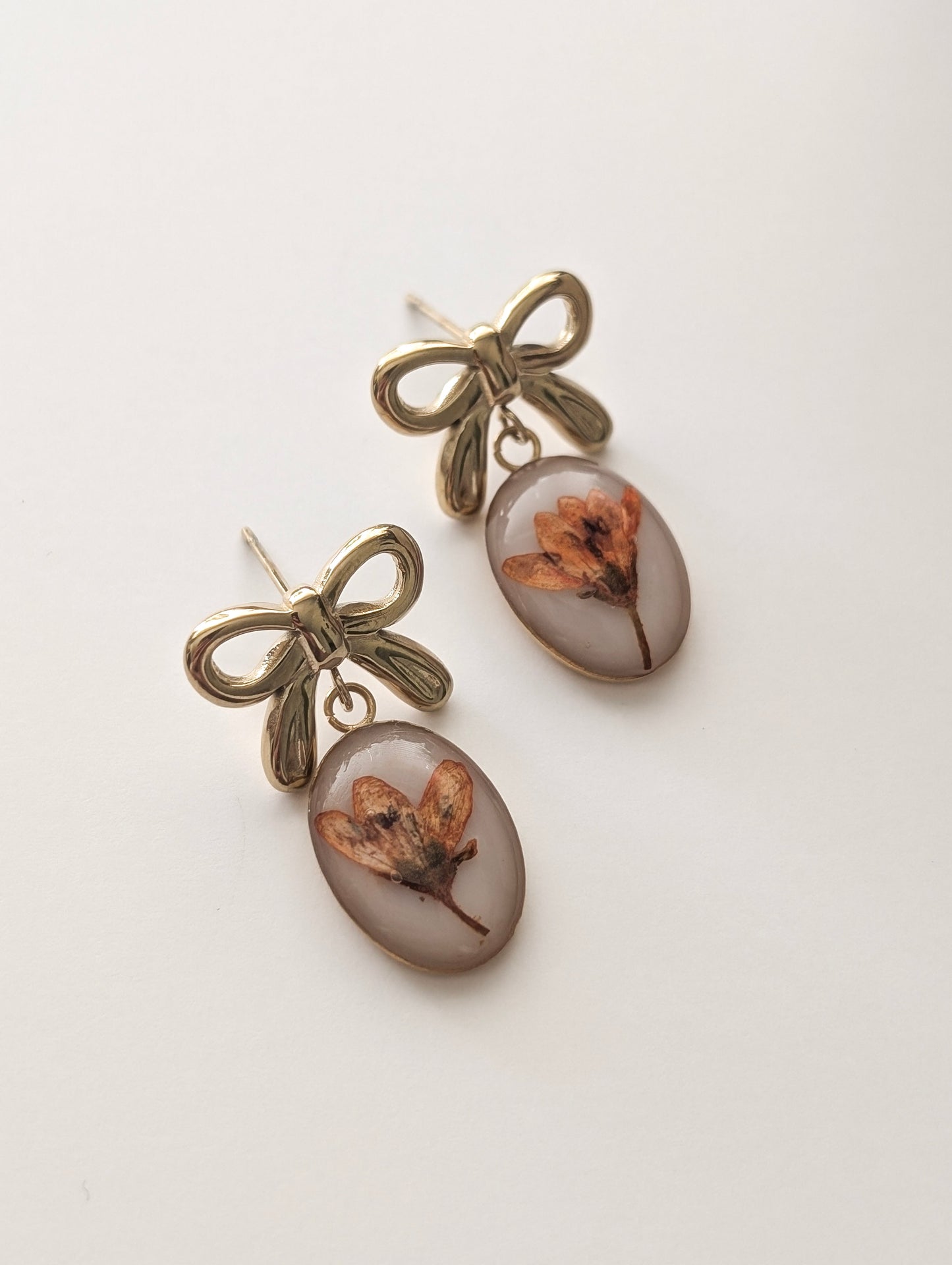 Orange Chloris Virgata Pressed Flora  | Gold Plated Stainless Steel Bow Stud Earrings