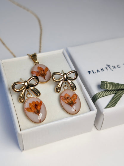Orange Chloris Virgata Pressed Flora Bow Jewellery Set | Gold Plated Stainless Steel
