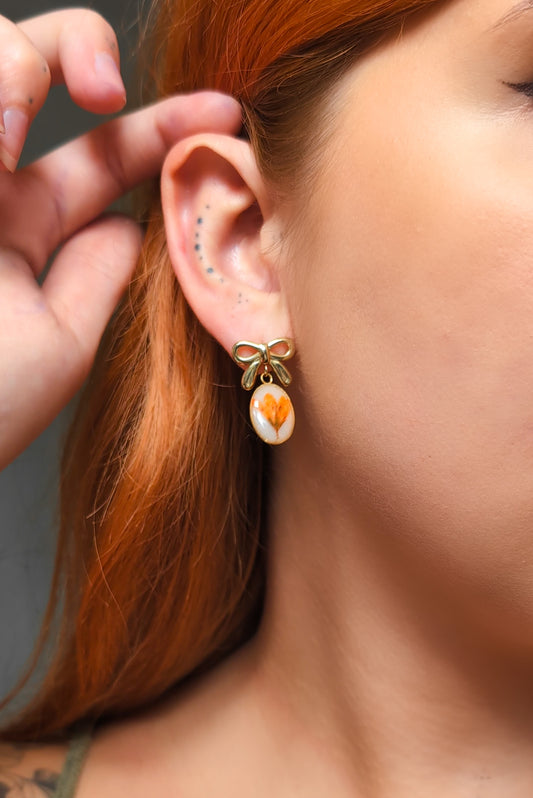Orange Chloris Virgata Pressed Flora  | Gold Plated Stainless Steel Bow Stud Earrings